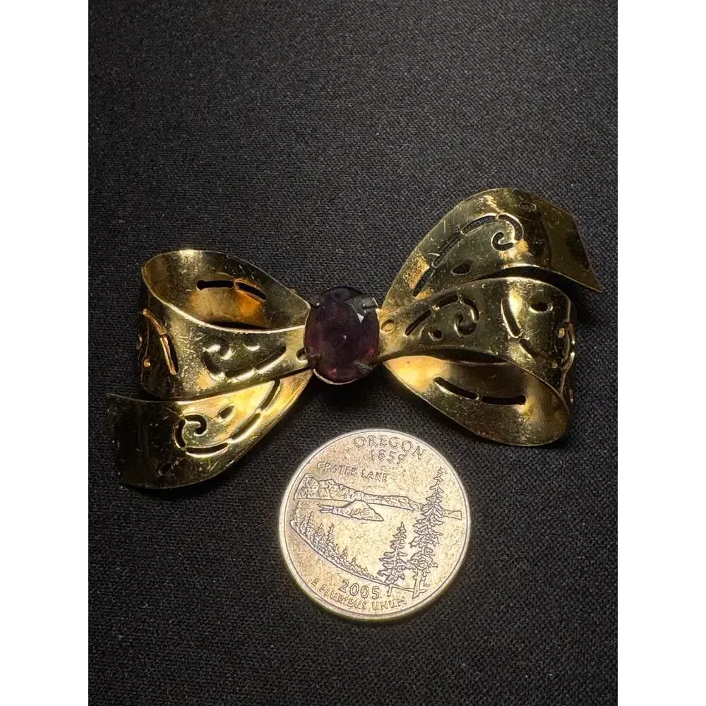 Vintage Coro Cut Out Bow Purple Glass Stone Brooch